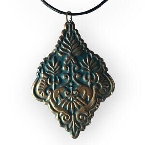 Green-washed brass tone bohemian upcycled pendant necklace